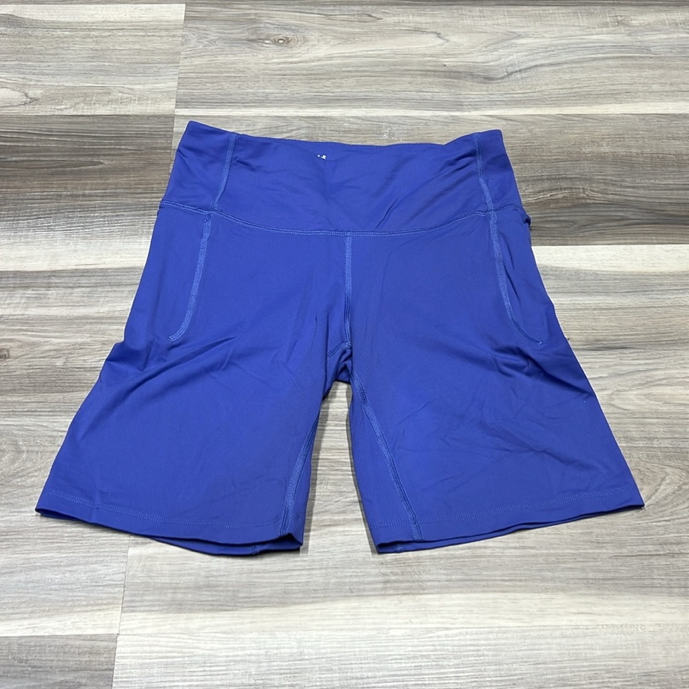 Under armour blue bike shorts with pockets size medium